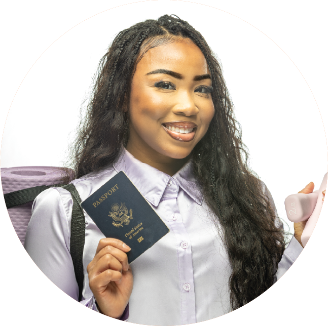 Kymbreanna Elliott holding a passport and a backpack
