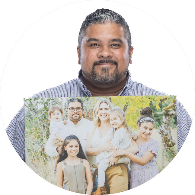 Photo of a man holding a family portrait