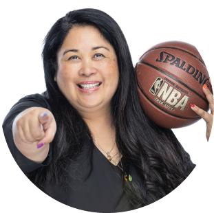 Dr. Jennifer Camota Luebke holding a basketball