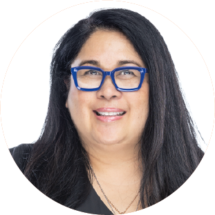 Headshot of Dr. Jennifer Camota Luebke wearing blue eyeglasses and black shirt. open more information dialog